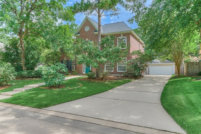 58 E Coldbrook Cir, The Woodlands, TX 77381 - view of front of property with brick siding, a garage, and concrete driveway