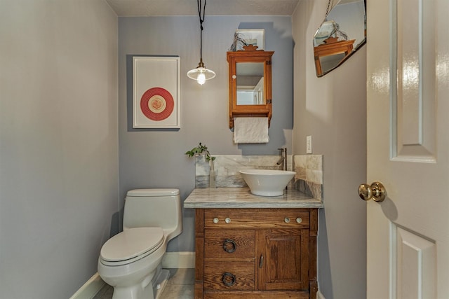 58 E Coldbrook Cir, The Woodlands, TX 77381 - half bathroom with vanity and tile patterned flooring