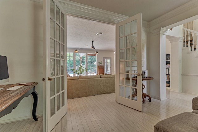 58 E Coldbrook Cir, The Woodlands, TX 77381 - office area with french doors and wood finished floors