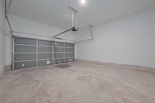 1609 Regents Gate, Houston, TX 77055 - garage featuring a garage door opener