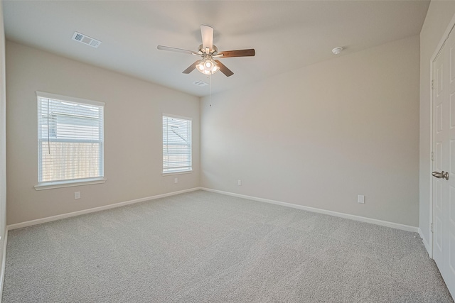 27076 Badger Way, Magnolia, TX 77354 - unfurnished room featuring a ceiling fan and carpet flooring