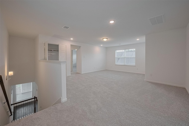 27097 Kestrel Trl, Magnolia, TX 77354 - empty room featuring light colored carpet and recessed lighting