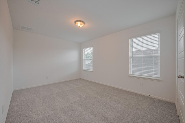27097 Kestrel Trl, Magnolia, TX 77354 - unfurnished room featuring light colored carpet and baseboards
