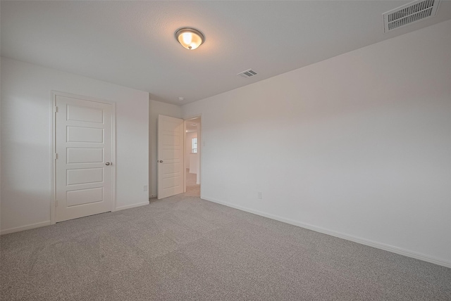 27097 Kestrel Trl, Magnolia, TX 77354 - unfurnished bedroom featuring baseboards and carpet floors