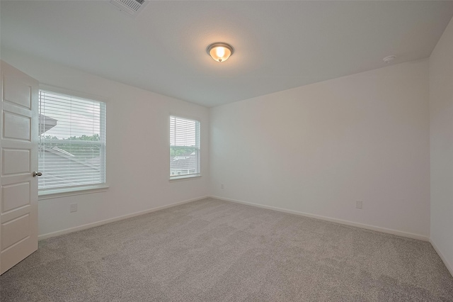 27097 Kestrel Trl, Magnolia, TX 77354 - empty room with light carpet and a smoke detector