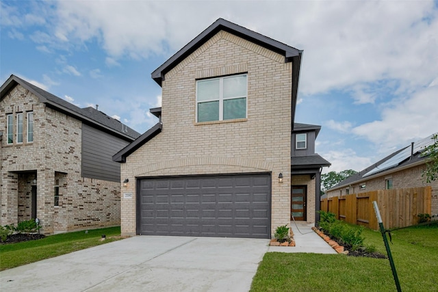 27097 Kestrel Trl, Magnolia, TX 77354 - view of front facade with a garage, concrete driveway, and brick siding