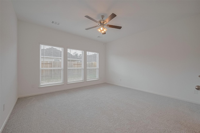 27097 Kestrel Trl, Magnolia, TX 77354 - spare room featuring ceiling fan and light colored carpet