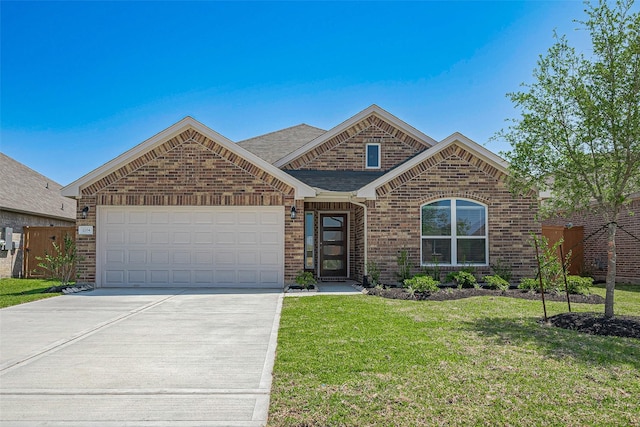 2204 Port Jackson, Texas City, TX 77568 - view of front of home with driveway, a garage, brick siding, and a shingled roof