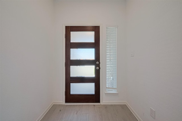 2204 Port Jackson, Texas City, TX 77568 - entryway with light wood-type flooring and baseboards