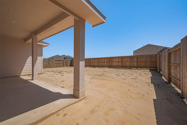 2204 Port Jackson, Texas City, TX 77568 - fenced backyard with a patio area