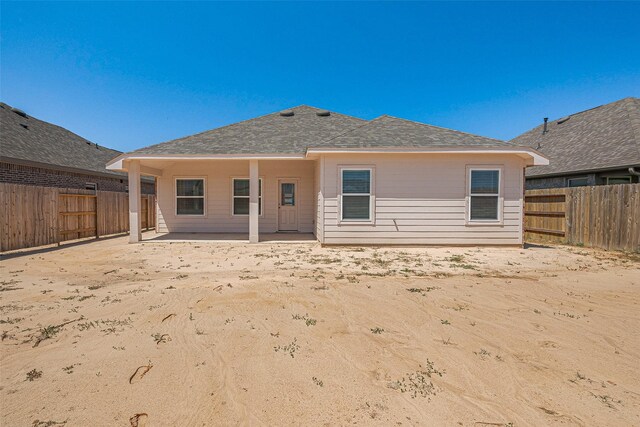 2204 Port Jackson, Texas City, TX 77568 - rear view of property with a fenced backyard, a patio area, and roof with shingles