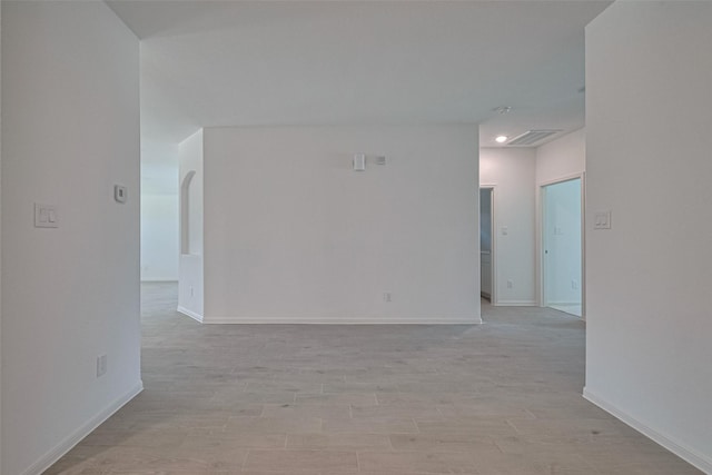 2204 Port Jackson, Texas City, TX 77568 - unfurnished room with light wood finished floors and arched walkways