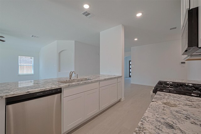 2204 Port Jackson, Texas City, TX 77568 - kitchen with dishwasher, light stone countertops, white cabinets, light wood-style floors, and recessed lighting