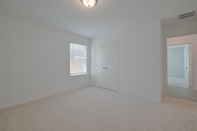 2204 Port Jackson, Texas City, TX 77568 - unfurnished bedroom featuring carpet and a closet