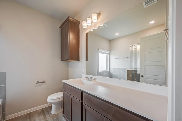2127 Port Jackson, Texas City, TX 77568 - full bath with vanity, wood finished floors, and an enclosed shower