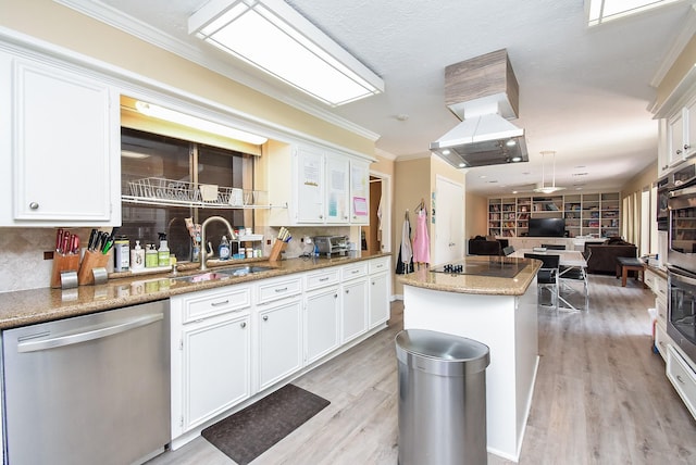 7719 Apache Plume Dr, Houston, TX 77071 - kitchen with dishwasher, open floor plan, light wood-style flooring, white cabinetry, and backsplash