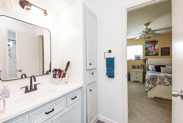 7719 Apache Plume Dr, Houston, TX 77071 - bathroom with vanity, ensuite bath, and ceiling fan