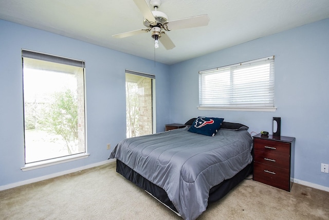 7719 Apache Plume Dr, Houston, TX 77071 - bedroom featuring carpet floors and a ceiling fan