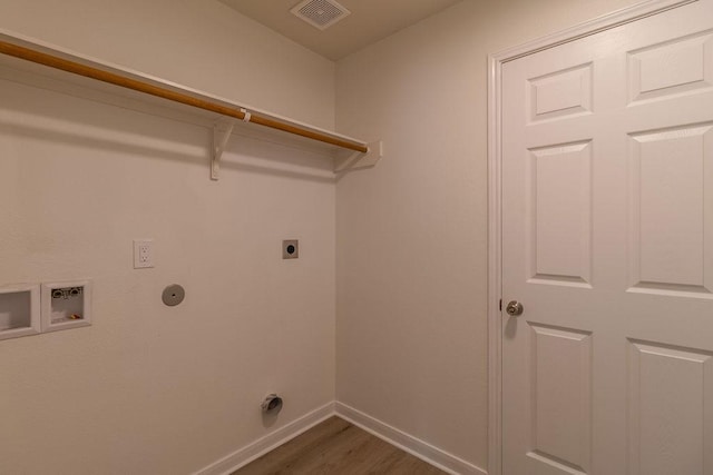 4310 Peppermint Hill Ln, Richmond, TX 77469 - laundry area featuring hookup for an electric dryer, dark wood finished floors, and hookup for a washing machine
