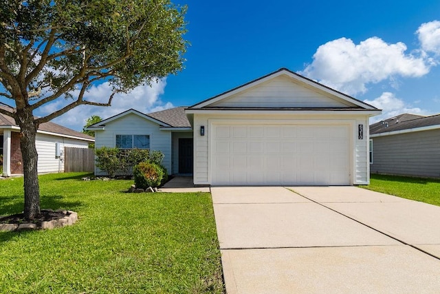 4310 Peppermint Hill Ln, Richmond, TX 77469 - ranch-style home featuring a front lawn, concrete driveway, and an attached garage