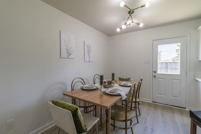 4310 Peppermint Hill Ln, Richmond, TX 77469 - dining room featuring light wood-style flooring and baseboards