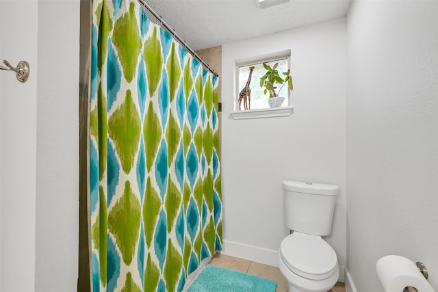 1731 W 22nd St, Houston, TX 77008 - bathroom featuring tile patterned floors and a shower with curtain