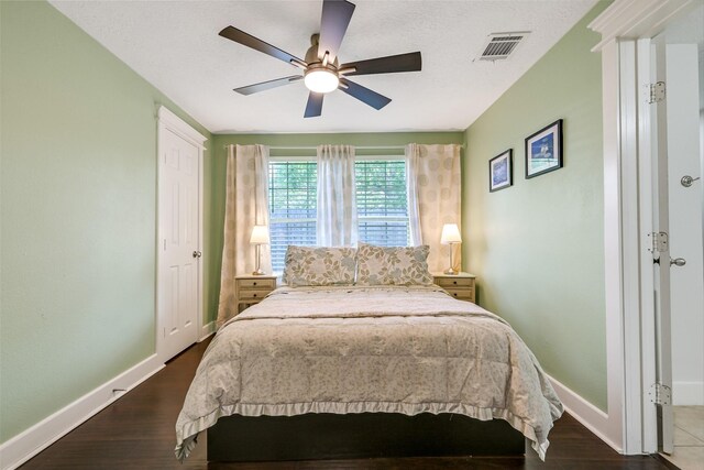1731 W 22nd St, Houston, TX 77008 - bedroom featuring dark wood-type flooring and a ceiling fan