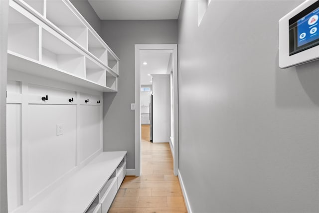 1412 Weiss St, Houston, TX 77009 - mudroom with light wood-style floors and baseboards