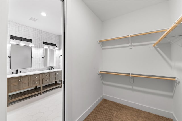 1412 Weiss St, Houston, TX 77009 - walk in closet featuring light tile patterned flooring