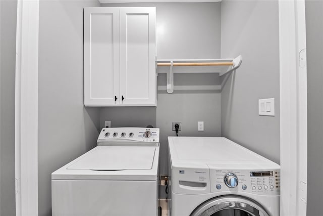 1412 Weiss St, Houston, TX 77009 - laundry room with cabinet space and separate washer and dryer