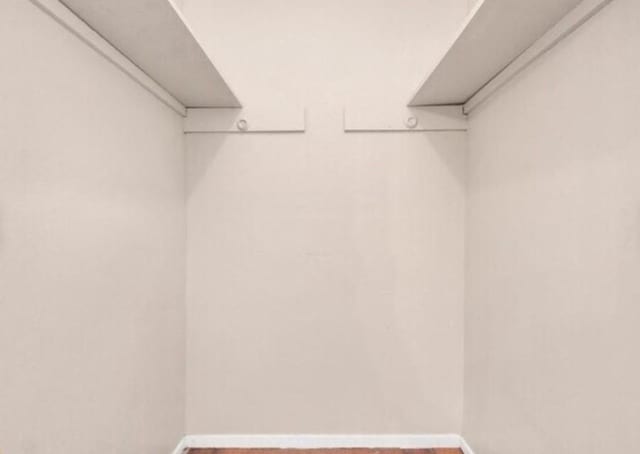 4803 Beechaven St, Houston, TX 77053 - walk in closet featuring wood finished floors