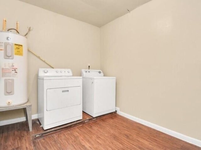 4803 Beechaven St, Houston, TX 77053 - washroom with water heater, separate washer and dryer, and wood finished floors