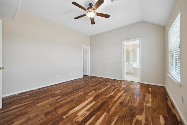 2411 Lacyberry St, Houston, TX 77080 - unfurnished bedroom with wood finished floors, vaulted ceiling, ensuite bath, and a ceiling fan