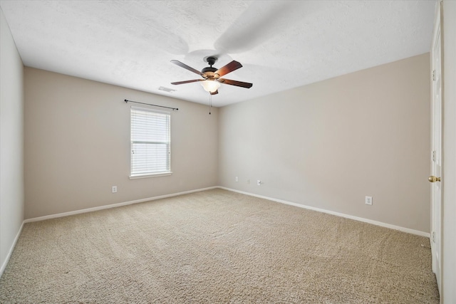 2411 Lacyberry St, Houston, TX 77080 - carpeted spare room featuring a ceiling fan and a textured ceiling