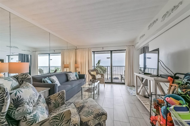 7310 Seawall Blvd Unit 404, Galveston, TX 77551 - living area with plenty of natural light and light tile patterned floors