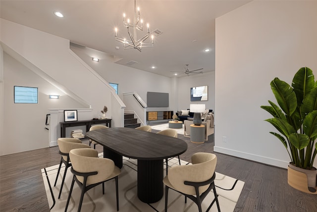 2205 Colorado St, Houston, TX 77007 - dining room with stairs, dark wood-style floors, a chandelier, recessed lighting, and ceiling fan