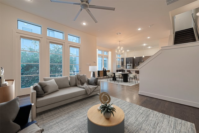 2205 Colorado St, Houston, TX 77007 - living area featuring stairway, a chandelier, recessed lighting, wood finished floors, and ceiling fan