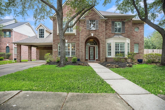 4619 Jade Green Ct, Houston, TX 77059 - view of front of property with brick siding, driveway, an attached garage, and roof with shingles