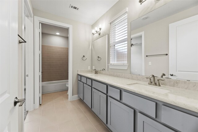 9418 Whispering Bald Cypress Ct, Cypress, TX 77433 - full bathroom with double vanity, tile patterned flooring, bathing tub / shower combination, and ceiling fan