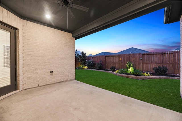 9418 Whispering Bald Cypress Ct, Cypress, TX 77433 - fenced backyard featuring ceiling fan and a patio
