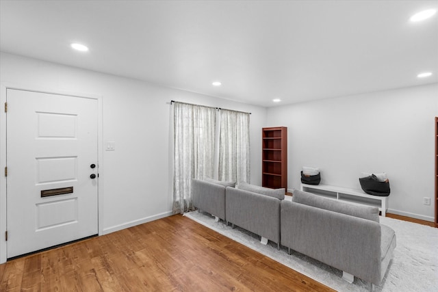 6697 De Moss Dr Unit 697, Houston, TX 77074 - living room with wood finished floors and recessed lighting