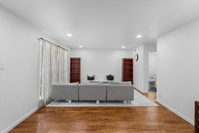 6697 De Moss Dr Unit 697, Houston, TX 77074 - living room with recessed lighting and wood finished floors