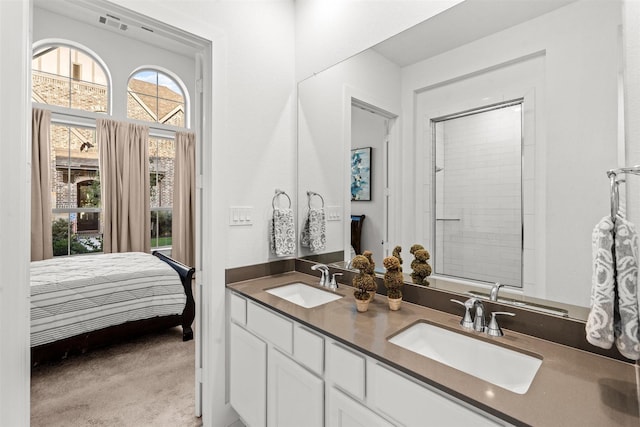 18247 Lakepoint Ridge Ln, Cypress, TX 77433 - full bathroom with double vanity and ensuite bathroom