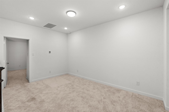 18247 Lakepoint Ridge Ln, Cypress, TX 77433 - empty room featuring light carpet and recessed lighting