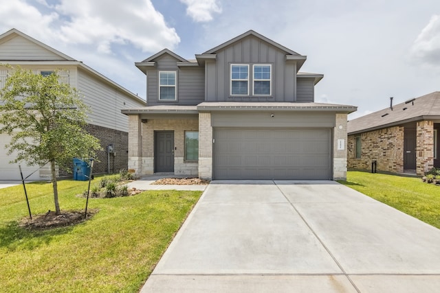 22431 Gilded Peak Ln, Spring, TX 77373 - view of front of house featuring board and batten siding, concrete driveway, a front lawn, and a garage