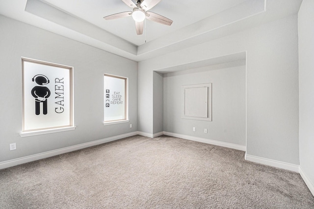 28702 Casen Ranch Ln, Fulshear, TX 77441 - carpeted empty room featuring a raised ceiling and ceiling fan