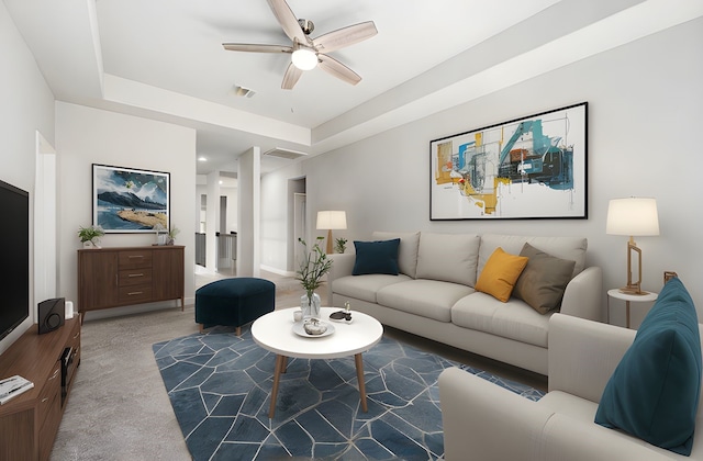28702 Casen Ranch Ln, Fulshear, TX 77441 - carpeted living area featuring ceiling fan and a tray ceiling