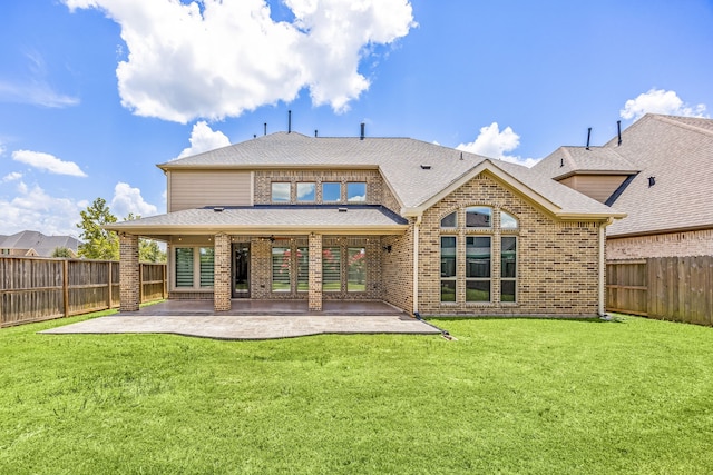 28702 Casen Ranch Ln, Fulshear, TX 77441 - rear view of house featuring brick siding, a patio area, and a fenced backyard