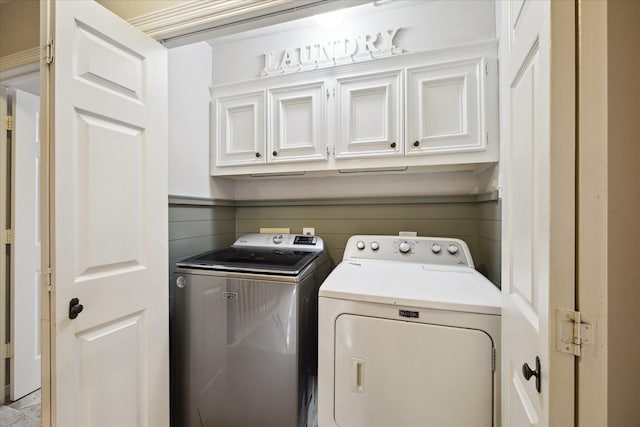 12511 Wealdstone Dr, Tomball, TX 77377 - laundry area featuring washing machine and clothes dryer and cabinet space