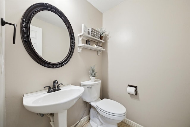 12511 Wealdstone Dr, Tomball, TX 77377 - bathroom featuring toilet and baseboards